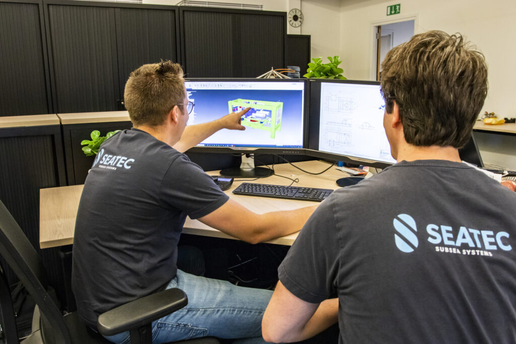 Employers behind computer